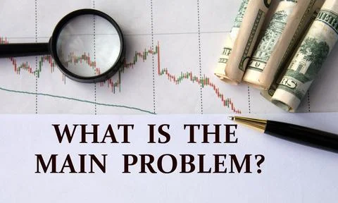 WHAT IS THE MAIN PROBLEM? - words on a white sheet against the background o.. Stock Photos