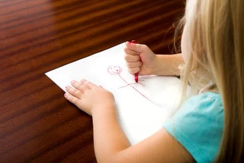 What is she drawing Stockfoto's
