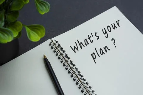 What is your plan text on notebook with dark background Stock Photos