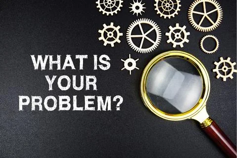 What Is Your Problem? text message with magnifying glass on black background Stock Photos