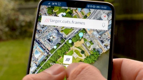 What3words app on the screen of smartphone. Stock Footage 115799317