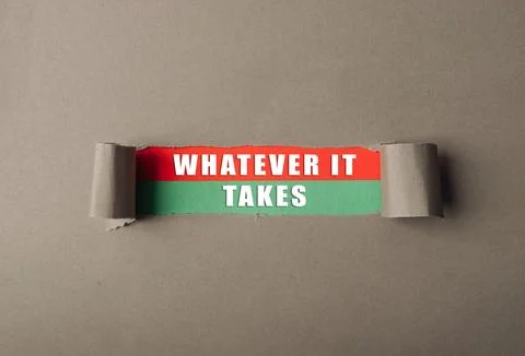 Whatever it takes is written on a torn piece of paper Stock Photos