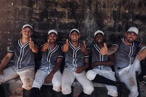 Whatever the question, the answer is baseball. a group of young baseball players Stock Photos