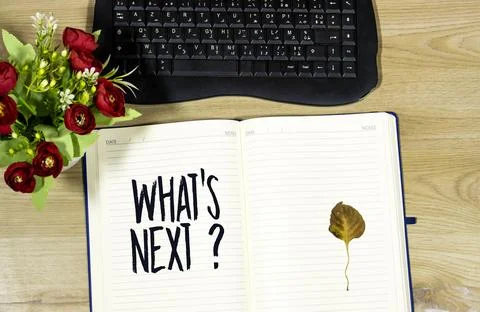 What's Next? Open Notebook With Message, Keyboard, Flower Bouquet and Dried Leaf Stock Photos