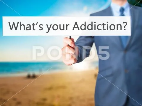 What's your Addiction - Businessman hand holding sign Stock Photos