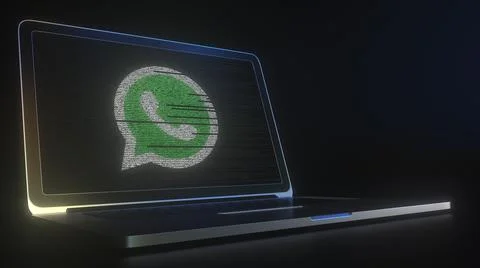 WHATSAPP logo made with computer code on the laptop screen. Editorial conceptual Stock Illustration
