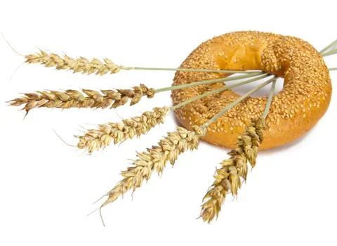 Wheat and bread on white background Stock Photos