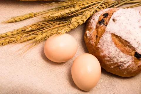 Wheat bread and eggs Stock Photos