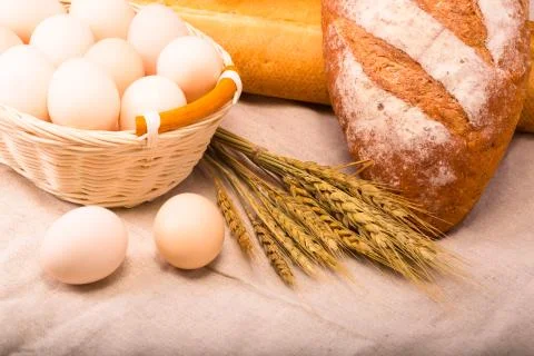 Wheat bread and eggs Stock Photos
