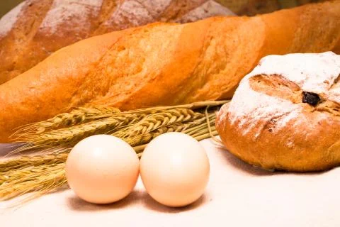 Wheat bread and eggs Stock Photos