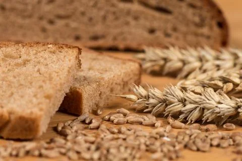 Wheat Bread And Grain Ears Stock Photos