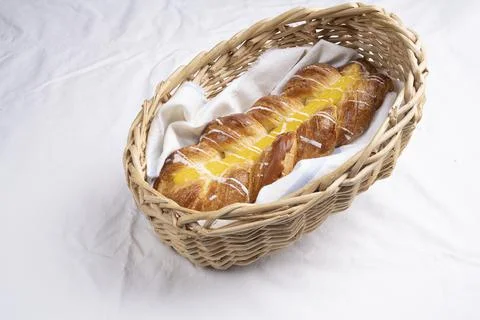 Wheat bread wicker sprinkled on a light background Stock Photos