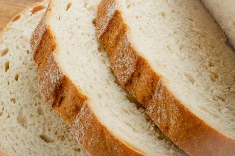 Wheat bread on a wooden table Stock Photos