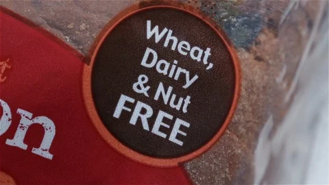 Wheat, Dairy and Nut-Free Label on a Bag of Bread Stock Footage 101390671