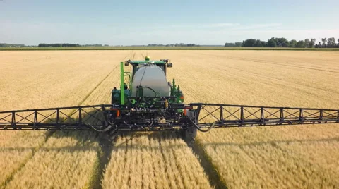 Wheat field being sprayed Stock-Footage 66811438