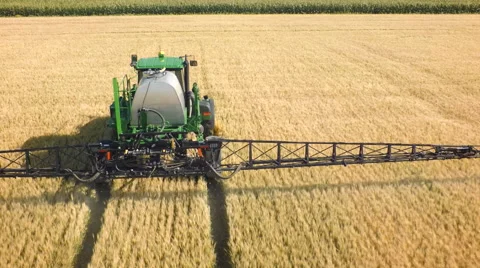 Wheat field being sprayed Stock-Footage 66818190
