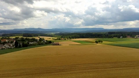 Wheat field with a highway in the background in germany Stock Footage 112856570