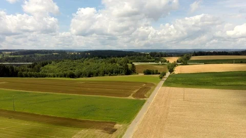 Wheat field with a highway in the background in germany Stock Footage 112975080