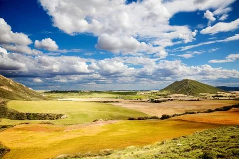 Wheat field landscape Landscape with fields and blue sky with clouds Copyr... Stock Photos