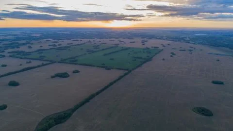 Wheat fields. Beautiful scenery from a height in sunset time. Photos from the Stock Photos