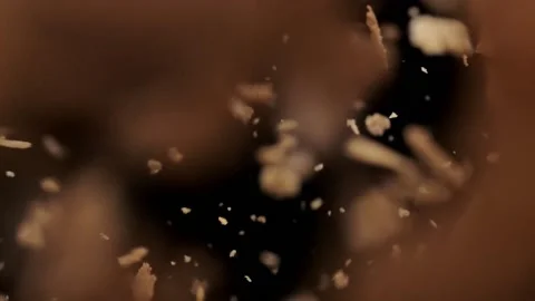 Wheat flakes fall on a black background Stock Footage 151119406