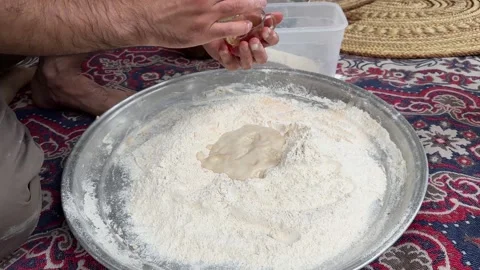Wheat flour fermentation process to make dough and bake flat pizza bread Stock Footage 257911599