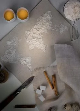 Wheat flour in the form of a world map. Food vintage. top view. overhead Stock Photos