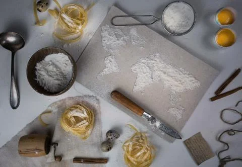 Wheat flour in the form of a world map. Food vintage. top view. overhead Stock Photos