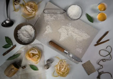 Wheat flour in the form of a world map. Food vintage. top view. overhead Stock Photos