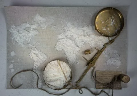 Wheat flour in the form of a world map. Food, scales vintage. top view. overhead Stock Photos