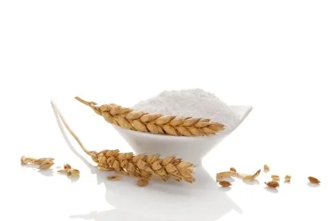 Wheat flour with wheat ears. Stock Photos