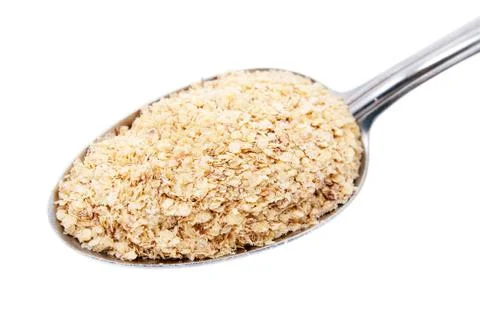 Wheat germ on the tablespoon Stock Photos