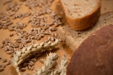 Wheat Grain Ears And Bread Slices Stock Photos