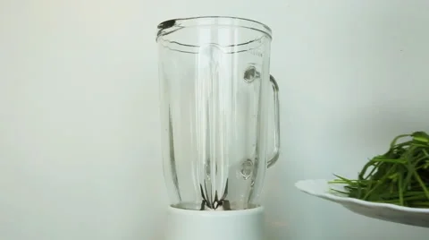 Wheat Green Sprouts in blender, a Raw Food Diet Stock Footage 59643207