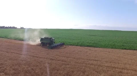 Wheat Harvest Combine Side View  - Drone Stock-Footage 65029955