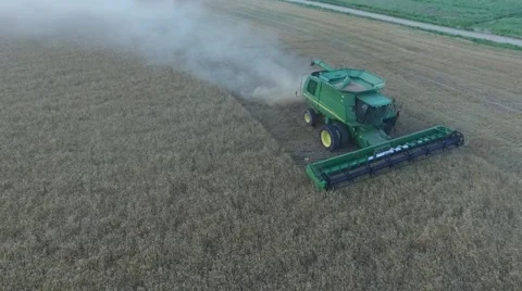 Wheat Harvest Combine Side View Aerial Shot - Drone Stock Footage 65029967
