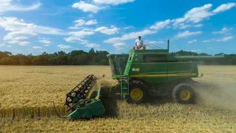 Wheat harvest with machine. Stock Photos