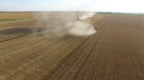 Wheat Harvest Two John Deere Combines - Drone Stock Footage 65028992