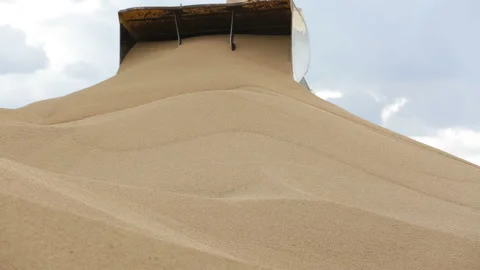 Wheat Loading Process Showcasing Bulk Grain Transportation and Handling Stock Footage 290200025