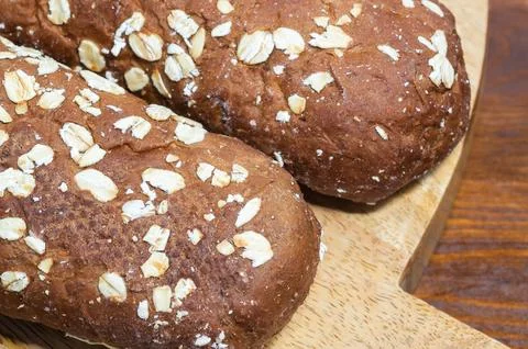 Wheat mini baguettes, brown bread. Close-up Foto stock