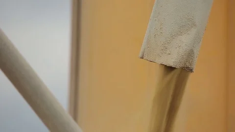 Wheat pours from a pipe in the back of the truck Stock Footage 74306899