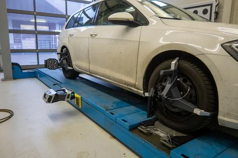 Wheel alignment with the latest laser technology is carried out in a car work Stock Photos