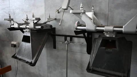 Wheel Alignment Machine in Workshop: Electric Emery Industrial. Stock Footage 311003310