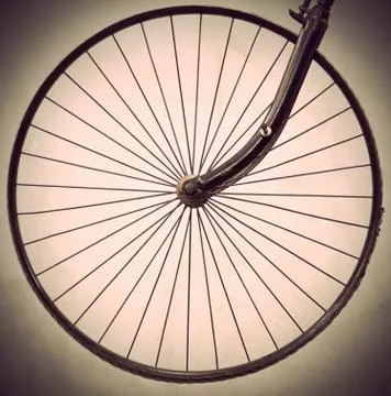 Wheel of ancient bicycle Stock Photos
