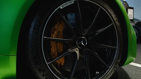 The wheel and disk brake of the new Mercedes-Benz GT-R AMG, a luxury sport car  Video stock 127655914