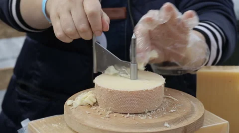 Wheel and slice of cheese on the farmer market Stock Footage 64107973