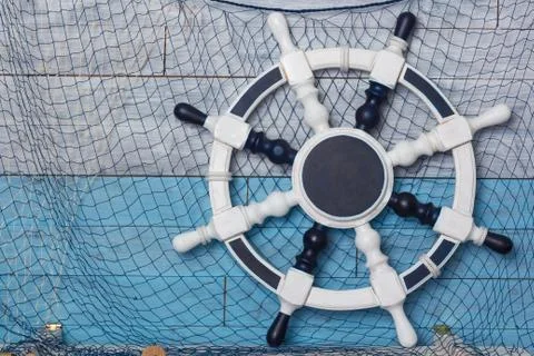 The wheel on a background of aged wood Stock Photos