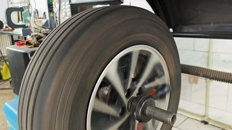 Wheel balancing at the service station Stock Footage 278044732