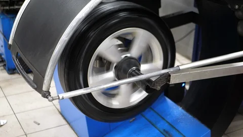 Wheel balancing.  slow motion, 4K UHD.  Stock Footage 85623955