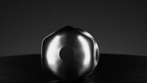 Wheel bolt rotation showcasing smooth, clean movement on dark surface Stock Footage 320533216